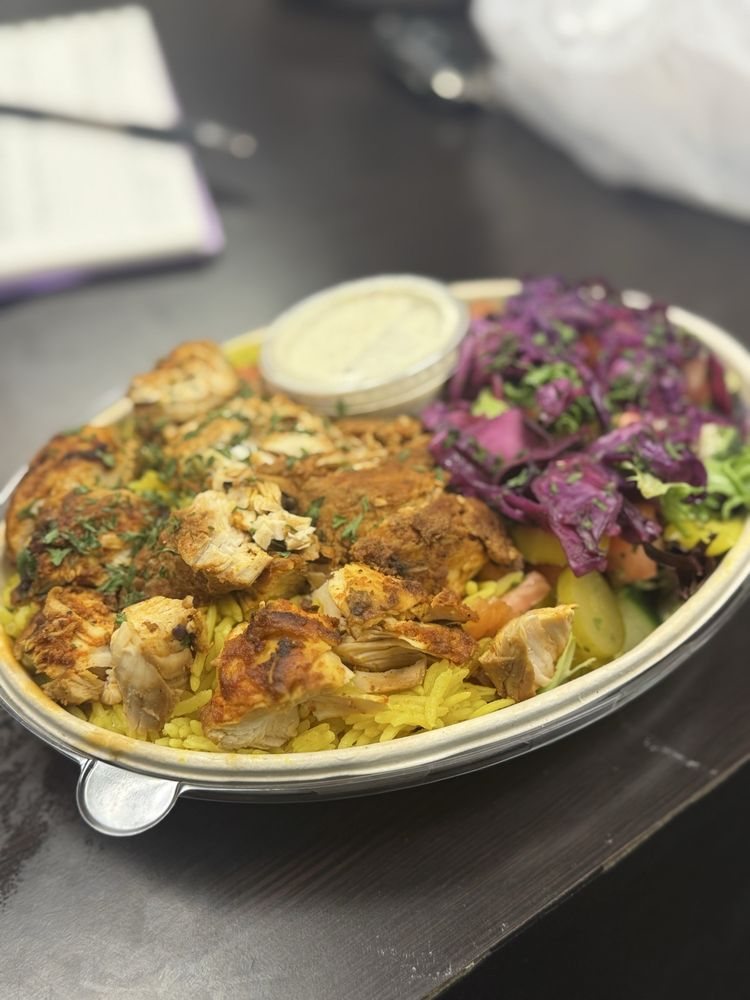 Zaki Grill chicken bowl with rice and red cabbage salad